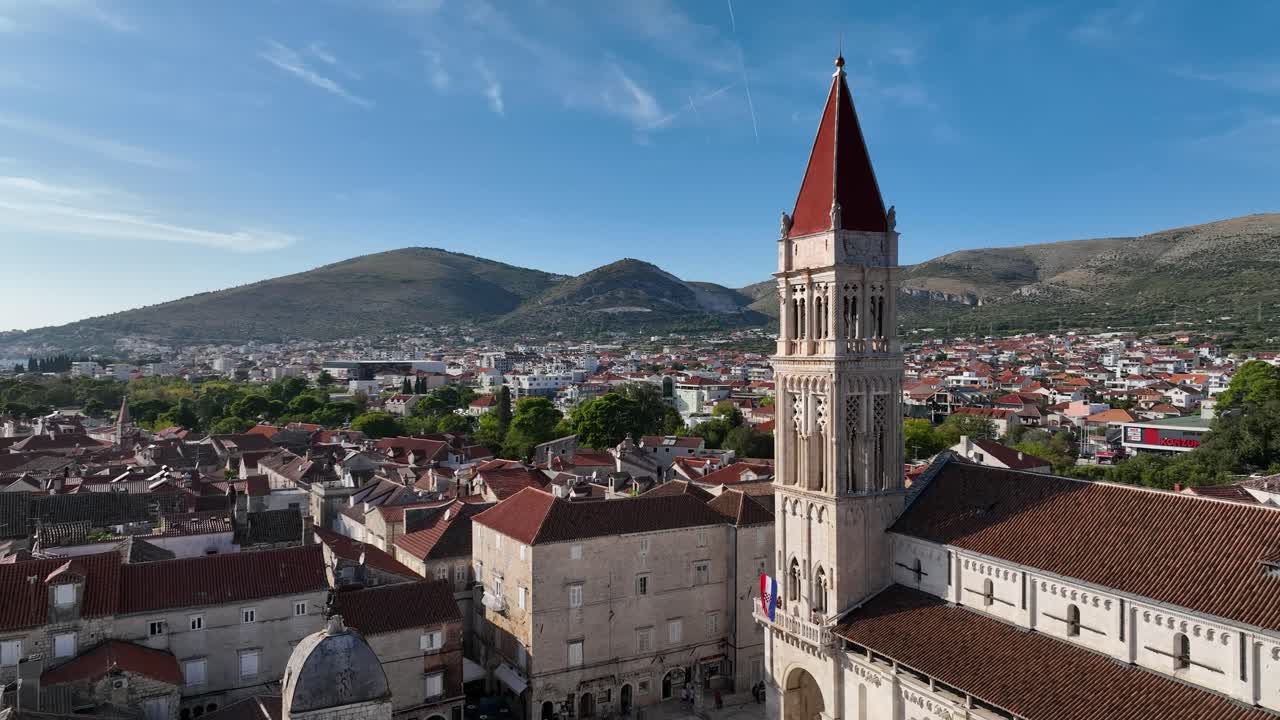 Establishing drone shot of Cathedral of St. Lawrence during the day in Trogir, Split-Dalmatia County, Croatia