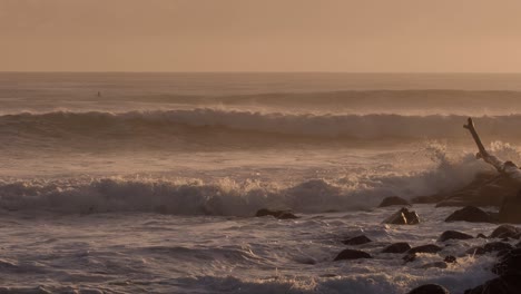 Waves-breaking-at-sunrise-at-Burleigh-Heads-on-the-Gold-Coast,-Queensland,-Australia