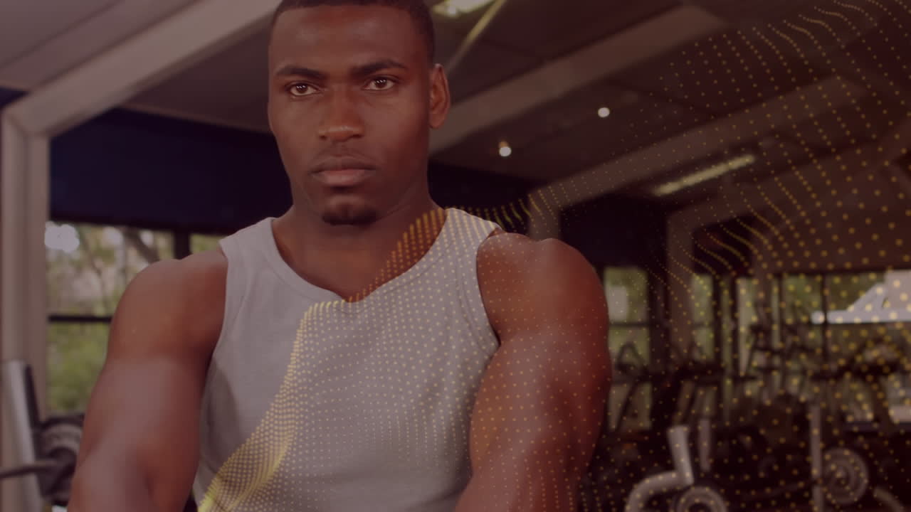 animación de puntos brillantes sobre el hombre haciendo ejercicio en el gimnasio