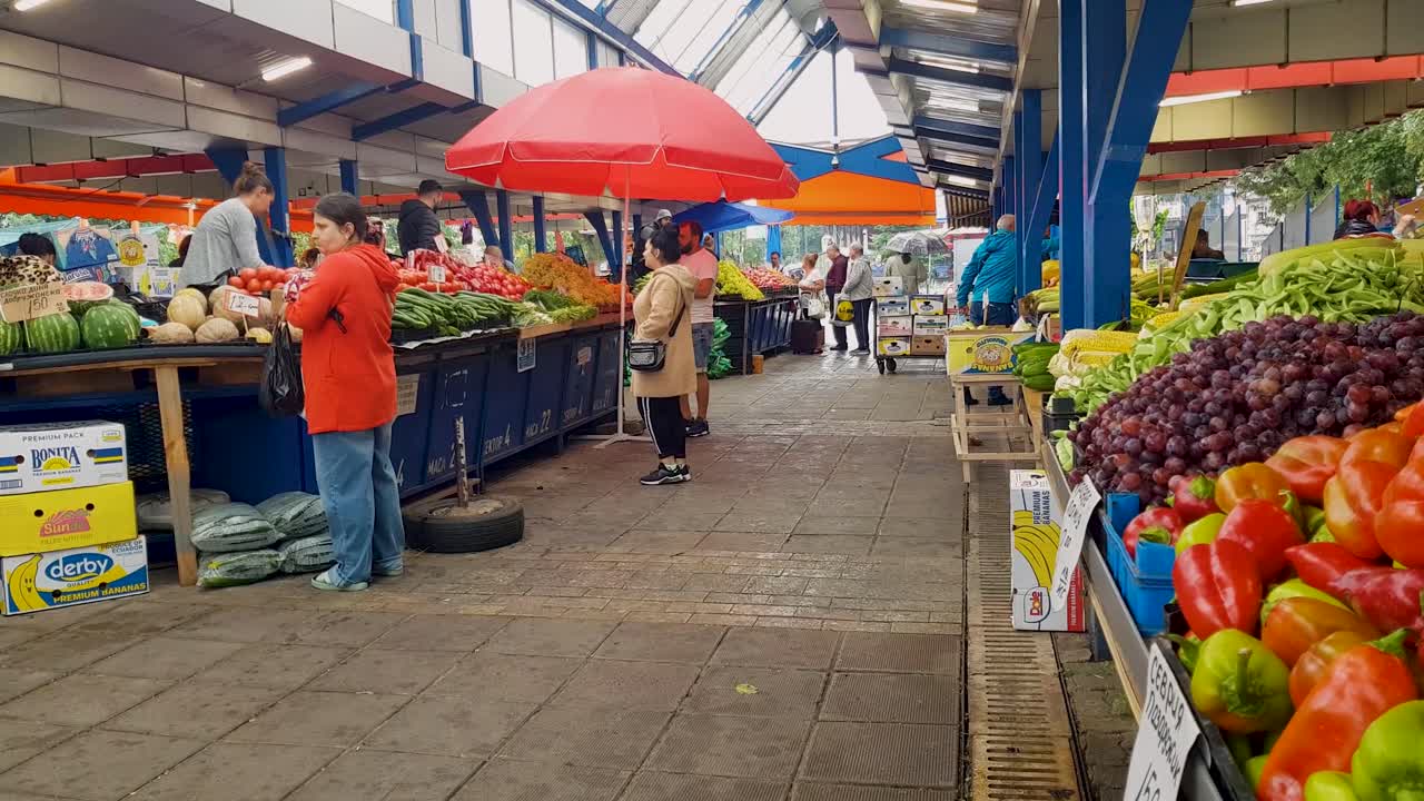 Busy Farmers Market on a Rainy Day
