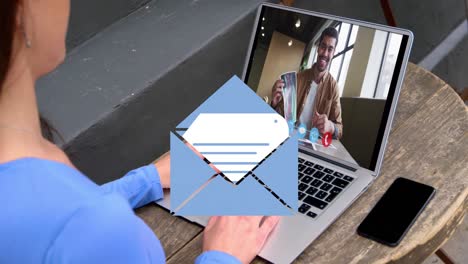 animation of email icon over caucasian woman on laptop video call