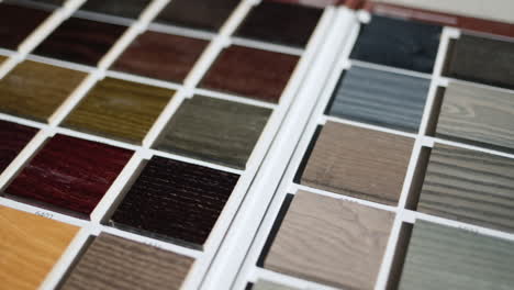 palette with painted wood samples to select the color of wood products.