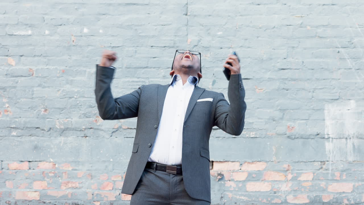 Celebrating business man cheering his promotion