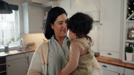 happy, love and mother with baby in a kitchen