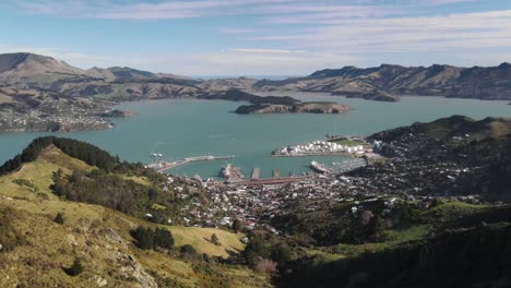 Aerial-establish-shot-of-Lyttelton-harbour-and-Banks-Peninsula,-New-Zealand-landscape