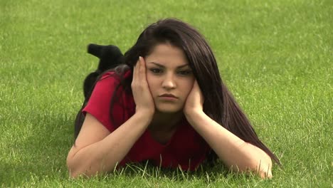 woman lying on grass