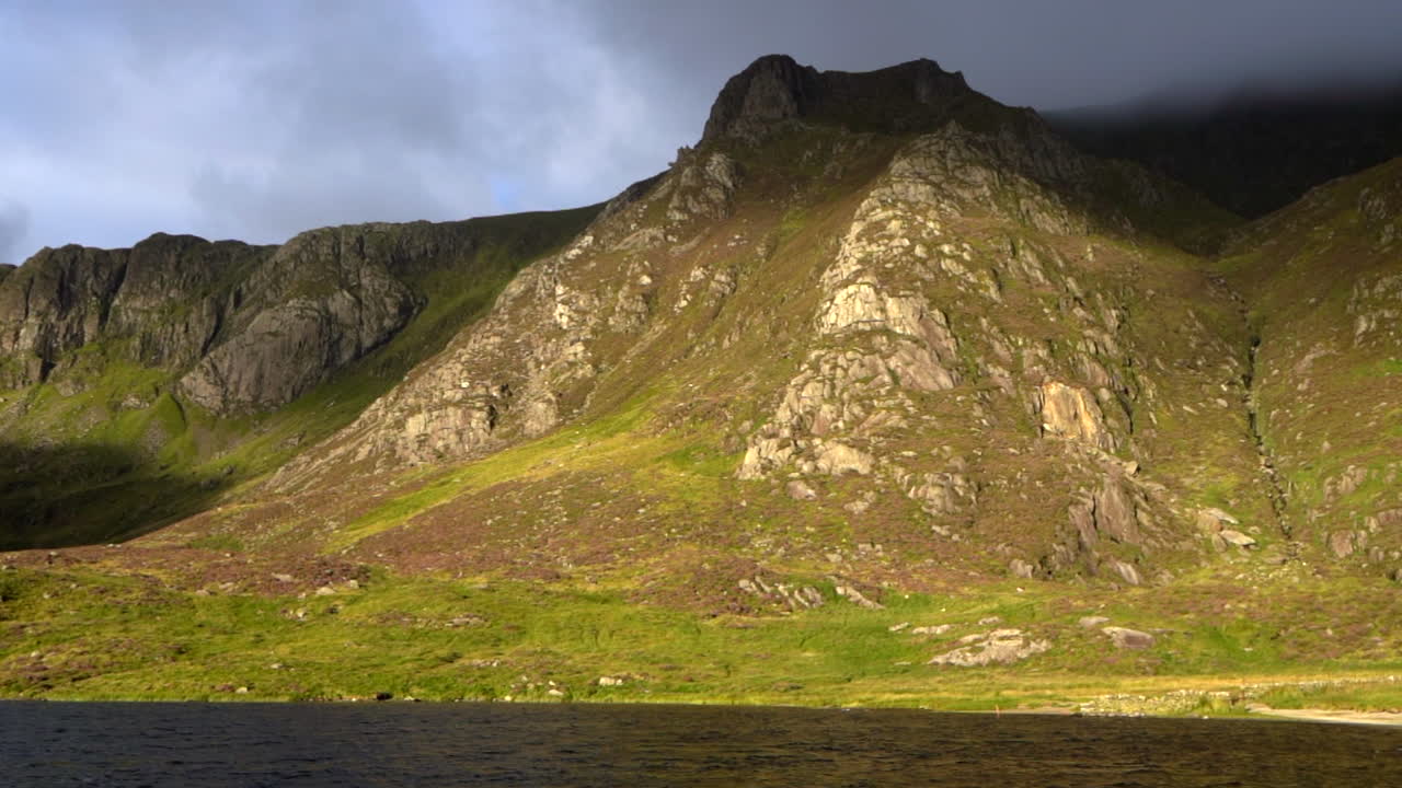 A panoramic early morning view of Cwm Idwal in Snowdonia with Llyn Idwal Lake