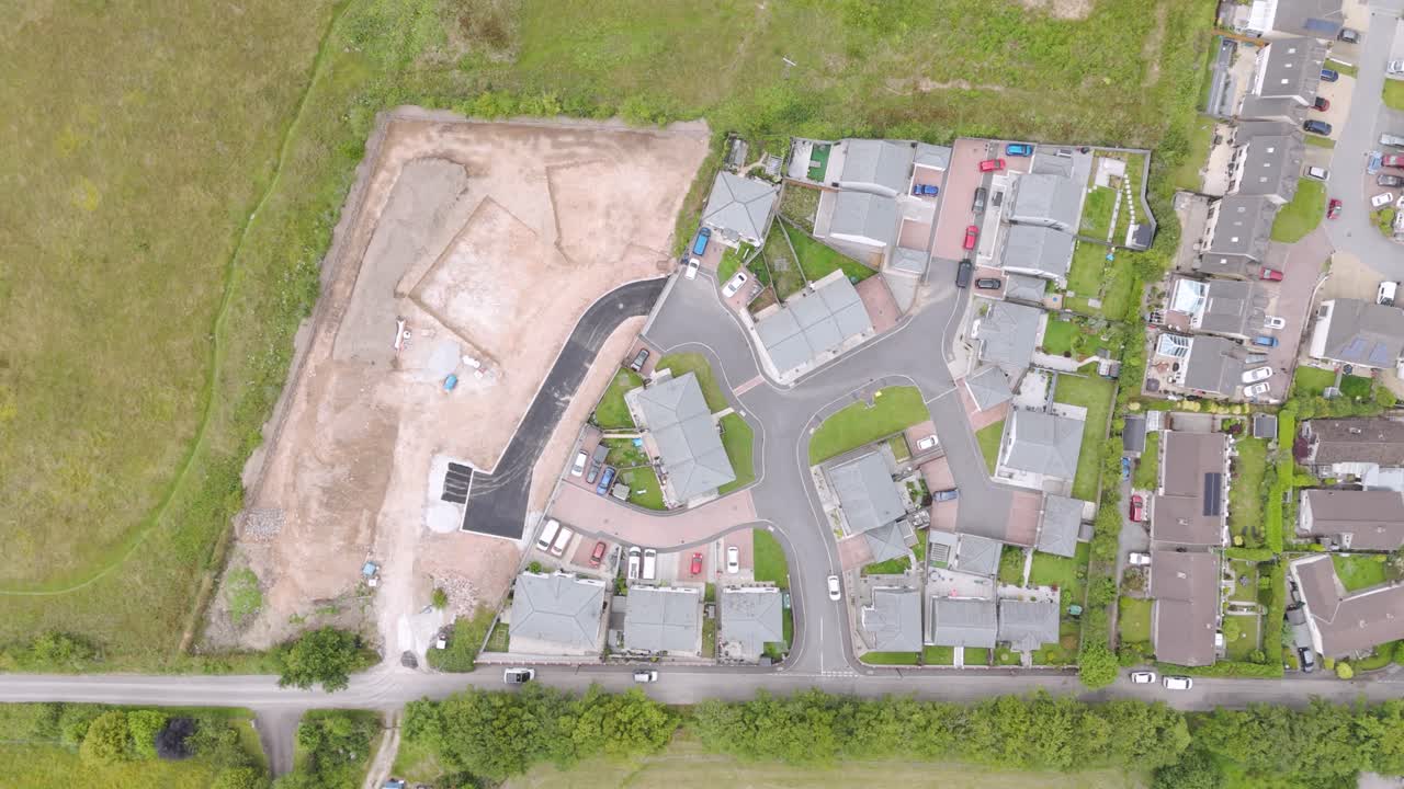 Aerial View of a New Housing Development Next to Existing Residential Area