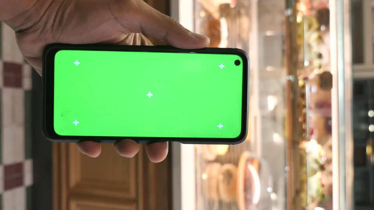 Smartphone con pantalla verde
