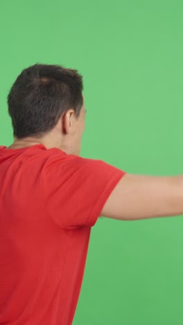 rear view of a man waving a russian pennant