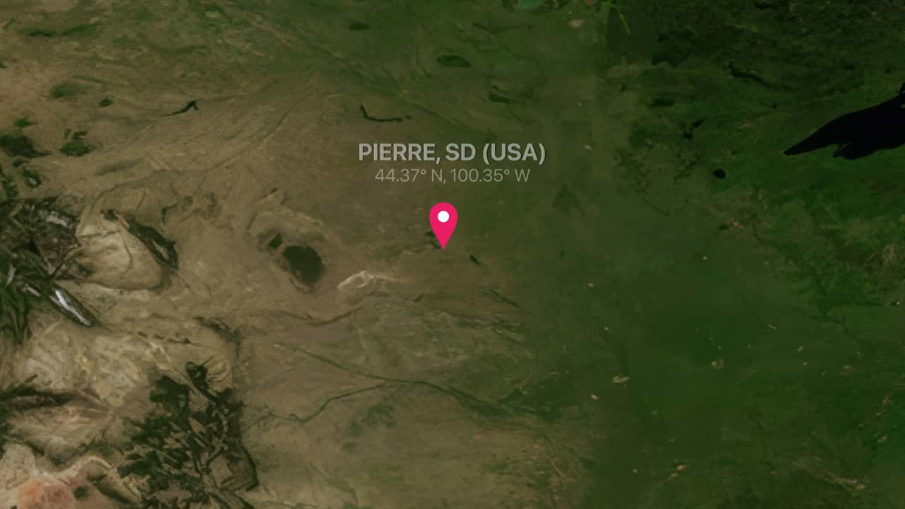 Render bumi digital memperbesar dari peta global ke lokasi spesifik di South Dakota