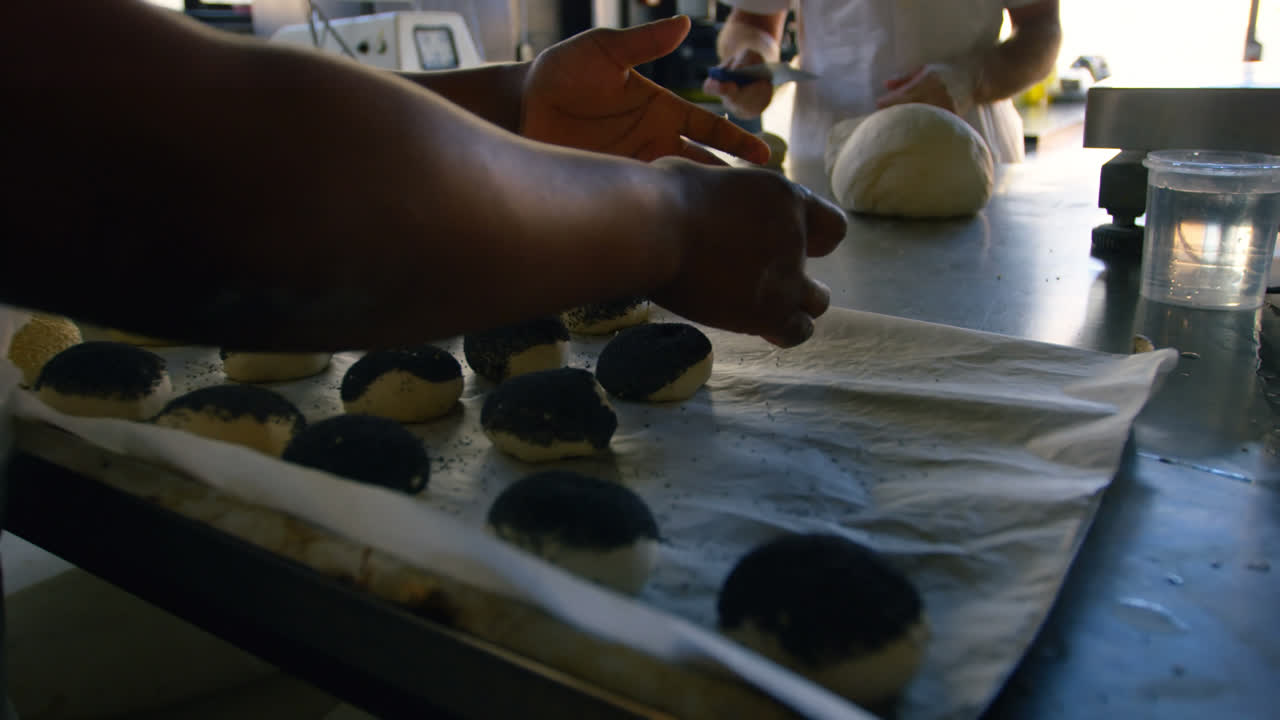 Chef arranging dough on worktop 4k