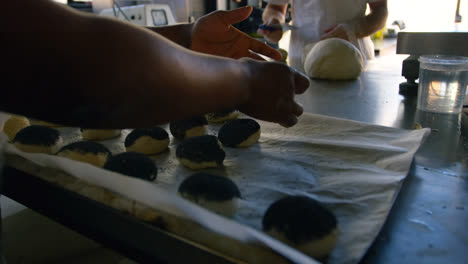 chef arranging dough on worktop 4k