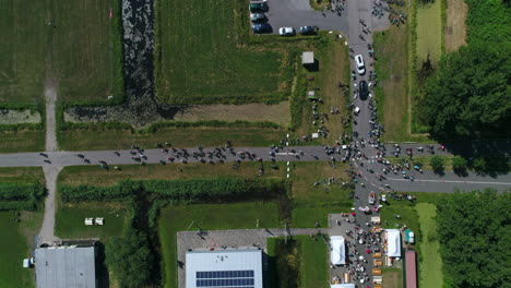 GRTC-Excelsior-Bicycle-Club-Cyclists-Biking-In-Countryside-Road-In-Gouda,-Netherlands