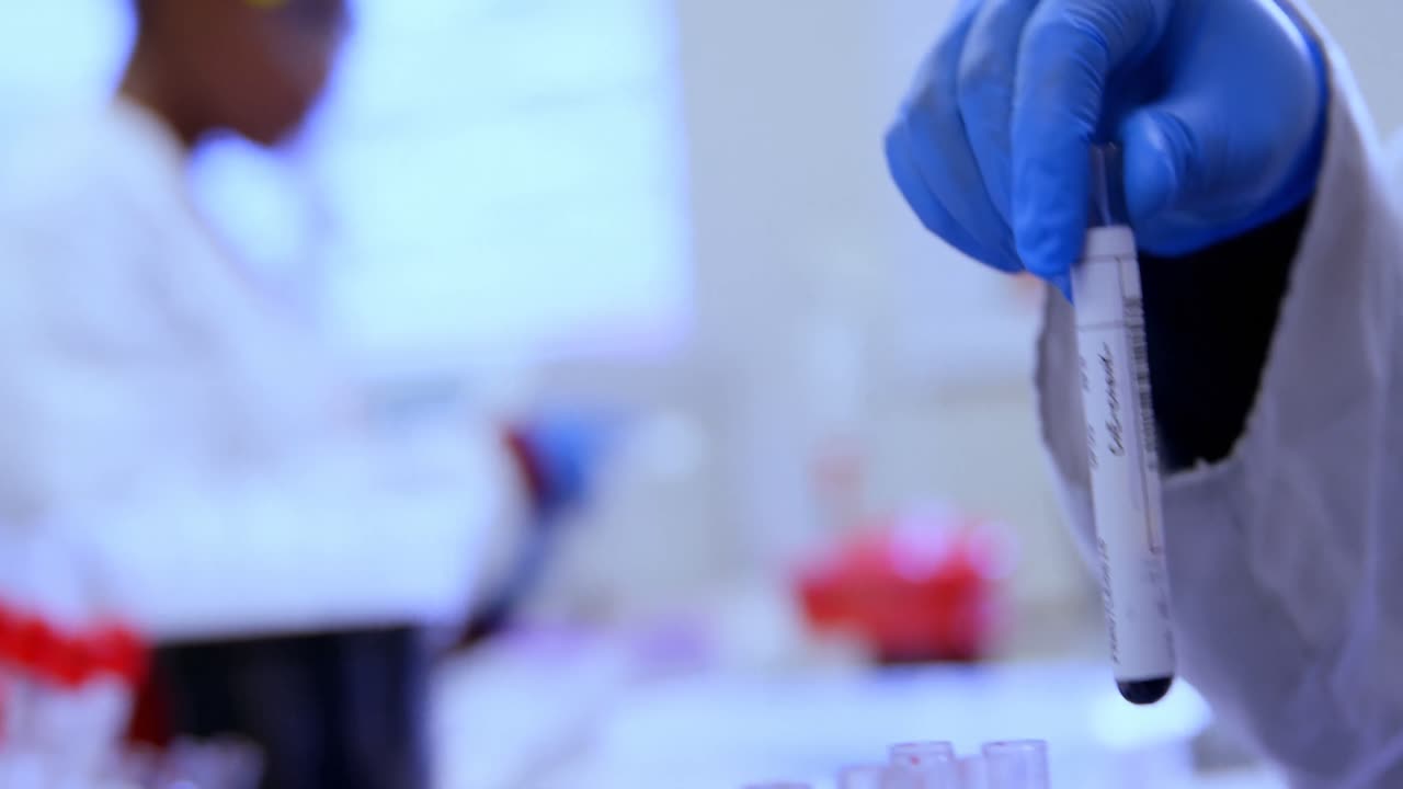 Laboratory technician working in blood bank 4k