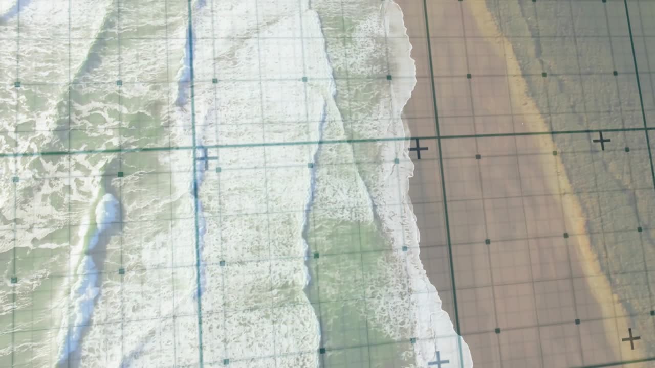 Camera panning up-right after focus shift, grid fixed, coastal band revealing headland for mapping