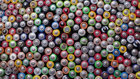 a large number of colored finger batteries a large number of colored finger batteries movement in a circle used aa batteries