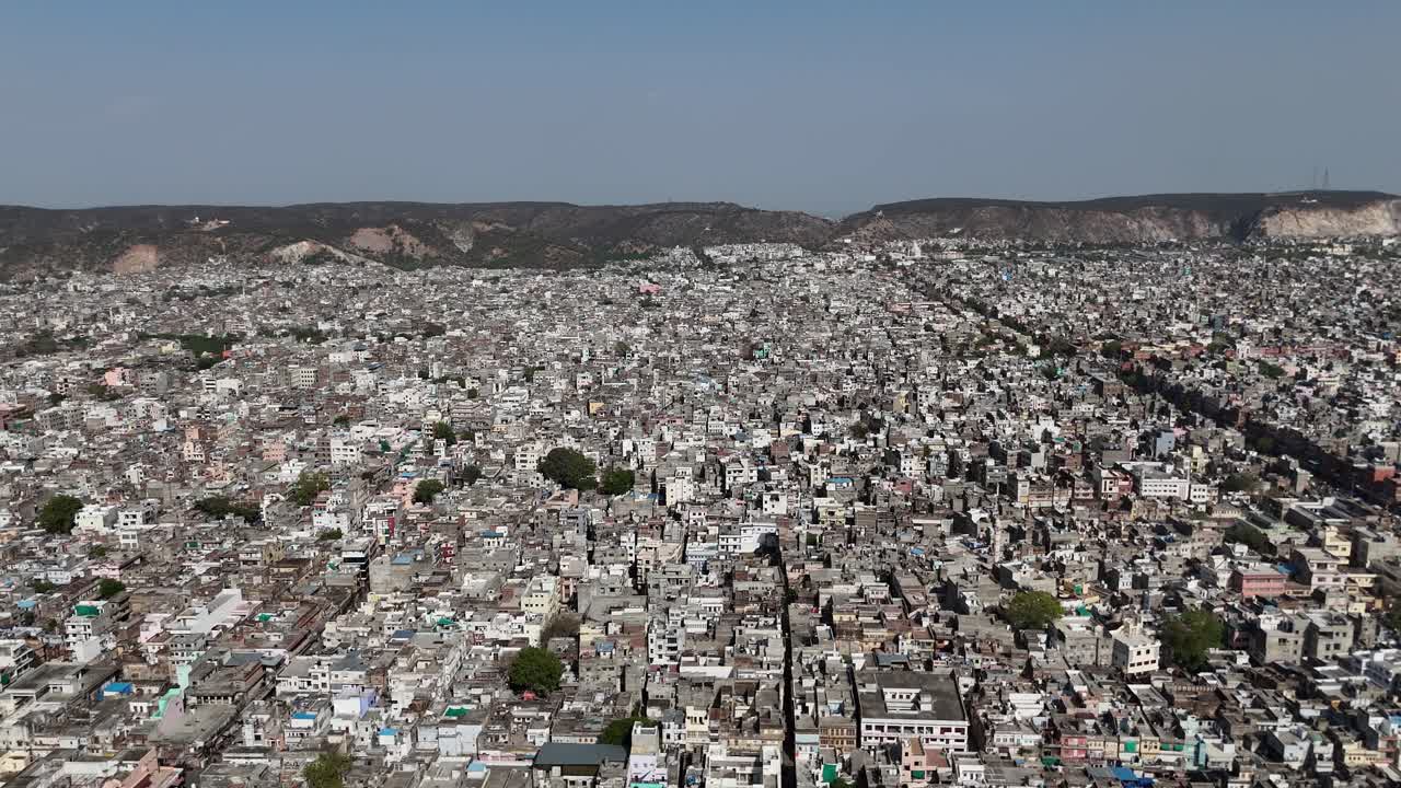 Aerial Drone Shot of Buildings with Mountain in the Background in Jaipur City