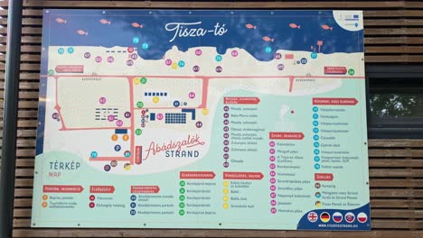 informational map from the abadszalok beach, including the facilities, services and recreational options at lake tisza, hungary.