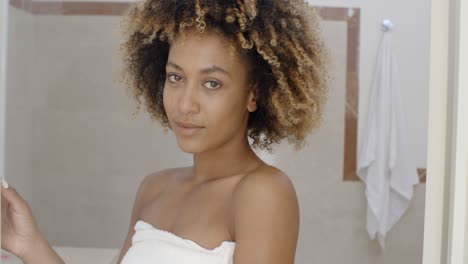 smiling young woman in towel