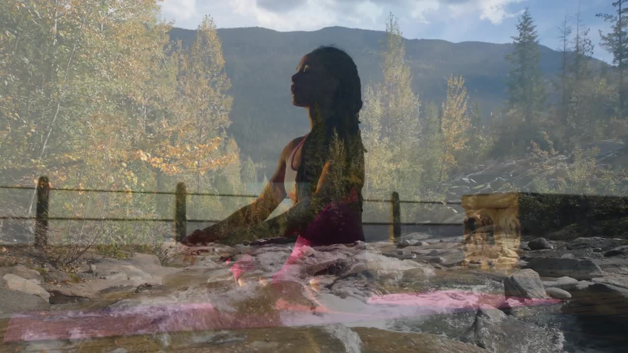 Yogi donna che medita su una sporgenza con vista sulla valle autunnale, sovrapposizione d'acqua che si dissolve aumentando il benessere