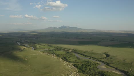 aerial of beautiful alberta countryside in canada featuring a winding river