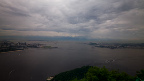 Cloudy Sky Over Urca Beach Near Sugar Loaf Mountain In Rio de Janeiro, Brazil. Aerial Shot