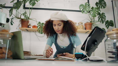 woman working in a cafe