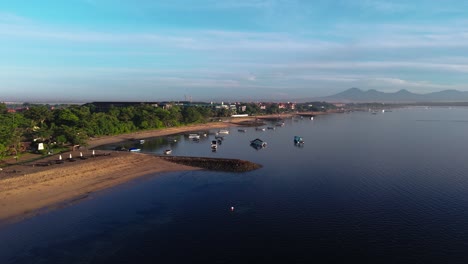 local boats and sandy coastline of indonesia, aerial drone view
