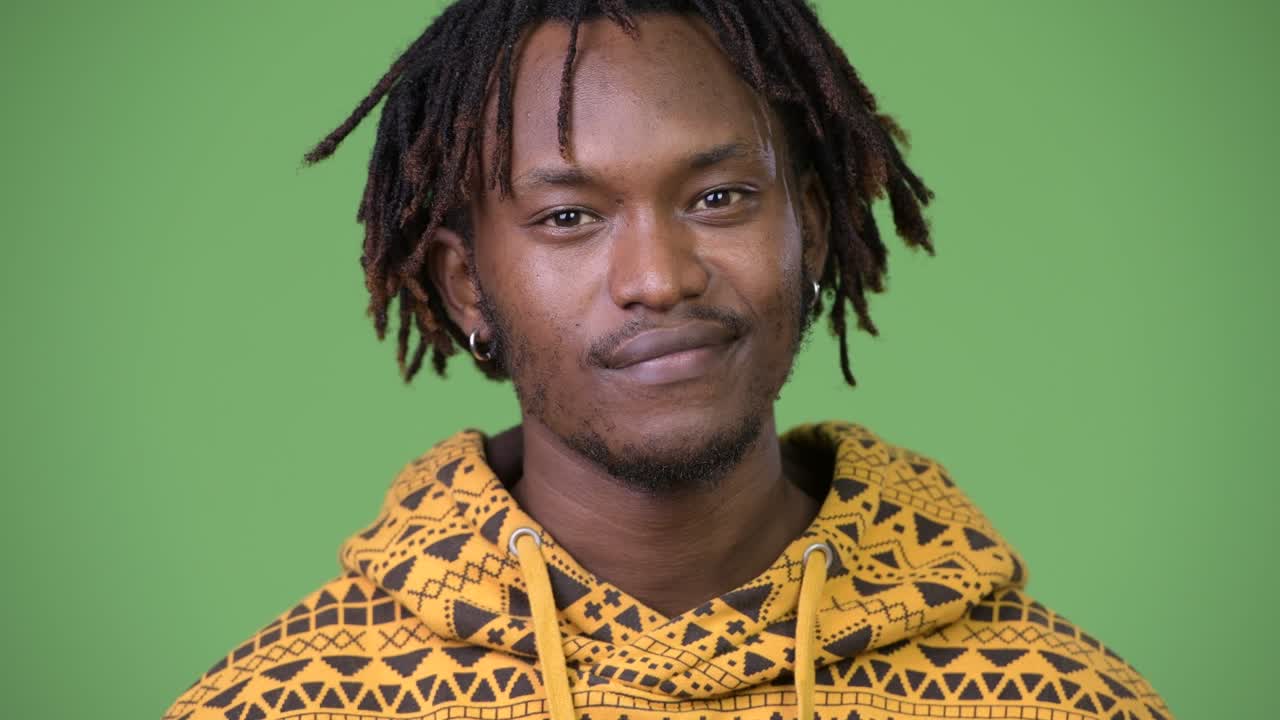 Young handsome African man nodding head yes