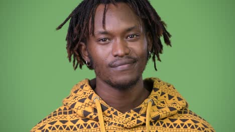 young handsome african man nodding head yes