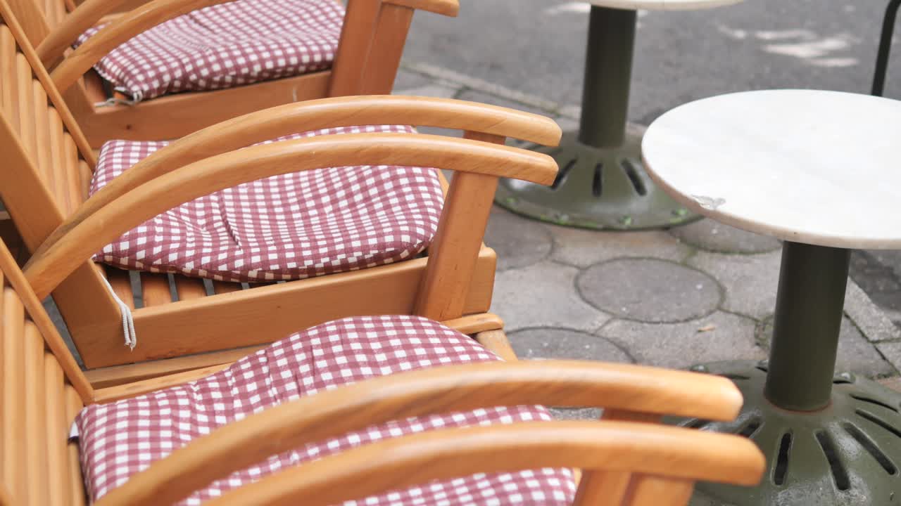 Outdoor Cafe Seating with Checkered Cushions