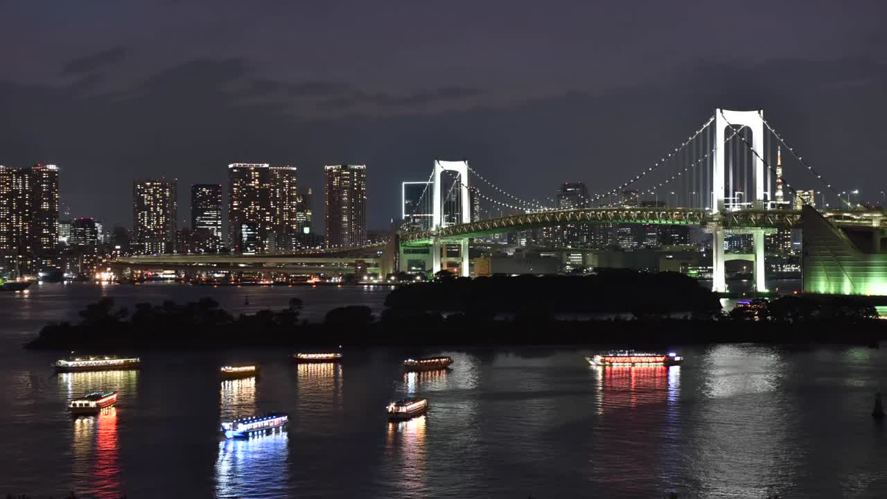 The Rainbow Bridge is a suspension bridge crossing northern Tokyo Bay between Shibaura Pier and the Odaiba waterfront development in Minato, Tokyo, Japan