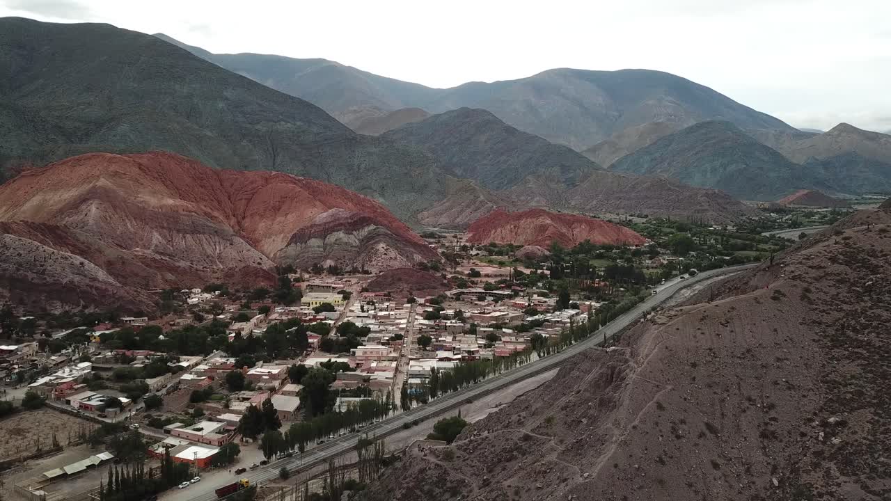 Jujuy, Argentina. Drone Aerial View of Rainbow Hill and Purmamarca City in Twilight