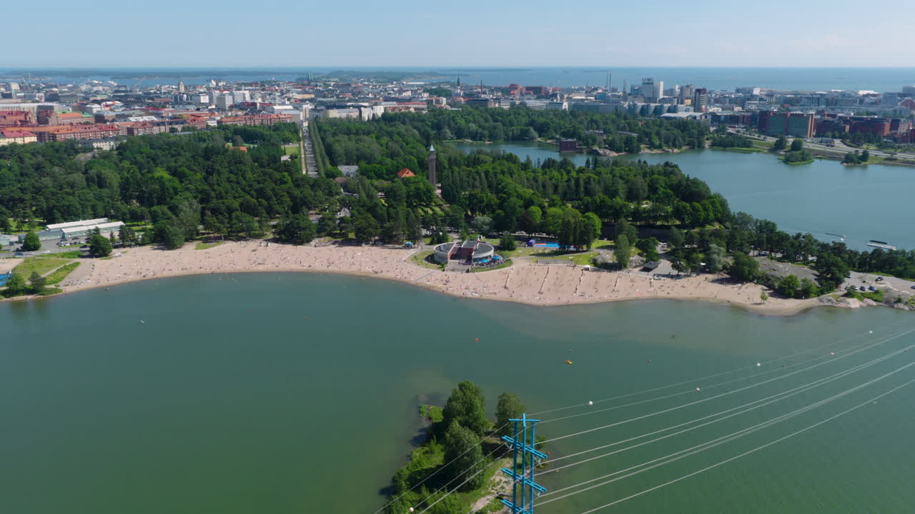 Drone circling the Hietaranta beach, summer day in Hietaniemi, Helsinki
