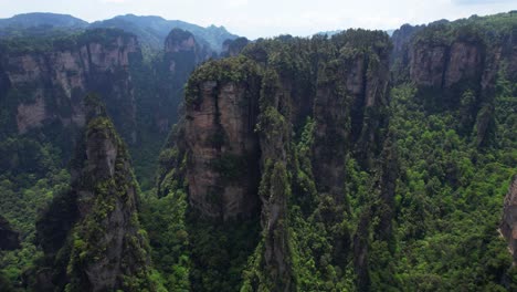 Drone-flying-towards-Hallelujah-Mountain-focusing-on-the-foresto-on-the-top