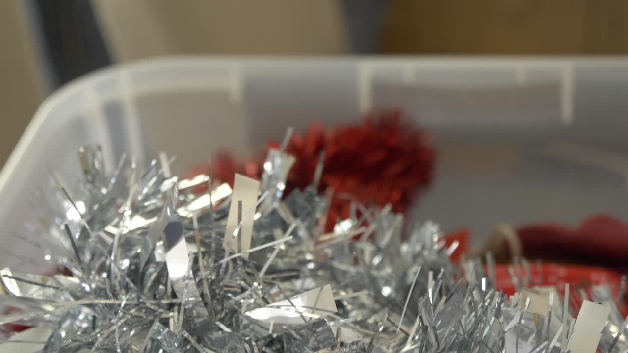 panning down on silver christmas tinsel