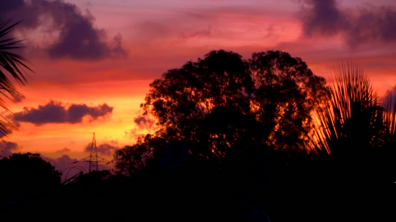 Picturesque of colorful sky during golden hour at sunset. Sliding left.