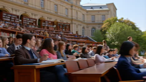 students engaged in learning and socializing on a university campus