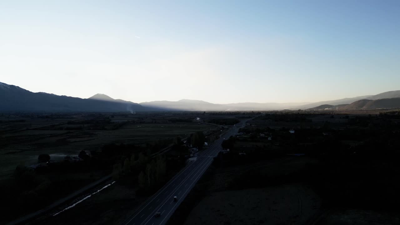 sunrise between the mountains. one side west and the other east