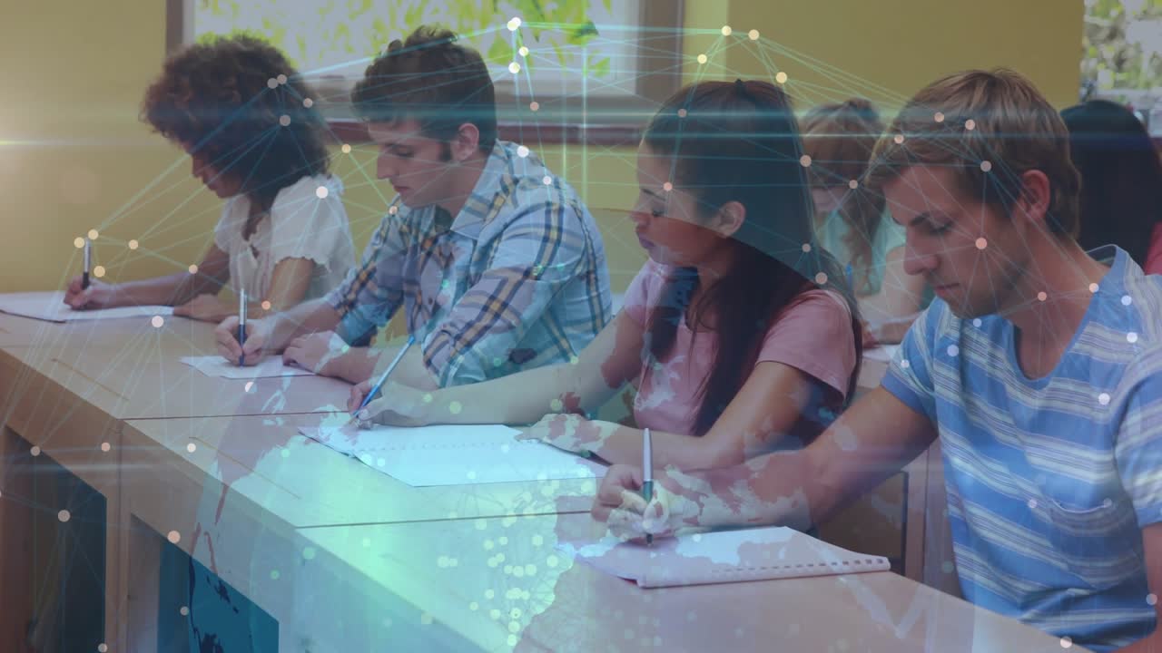 Students sitting at long desk writing for assessment, composited world map intensifying over desks
