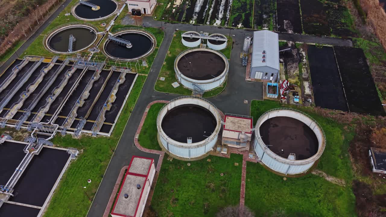 View of a waste water treatment facility from above during daylight