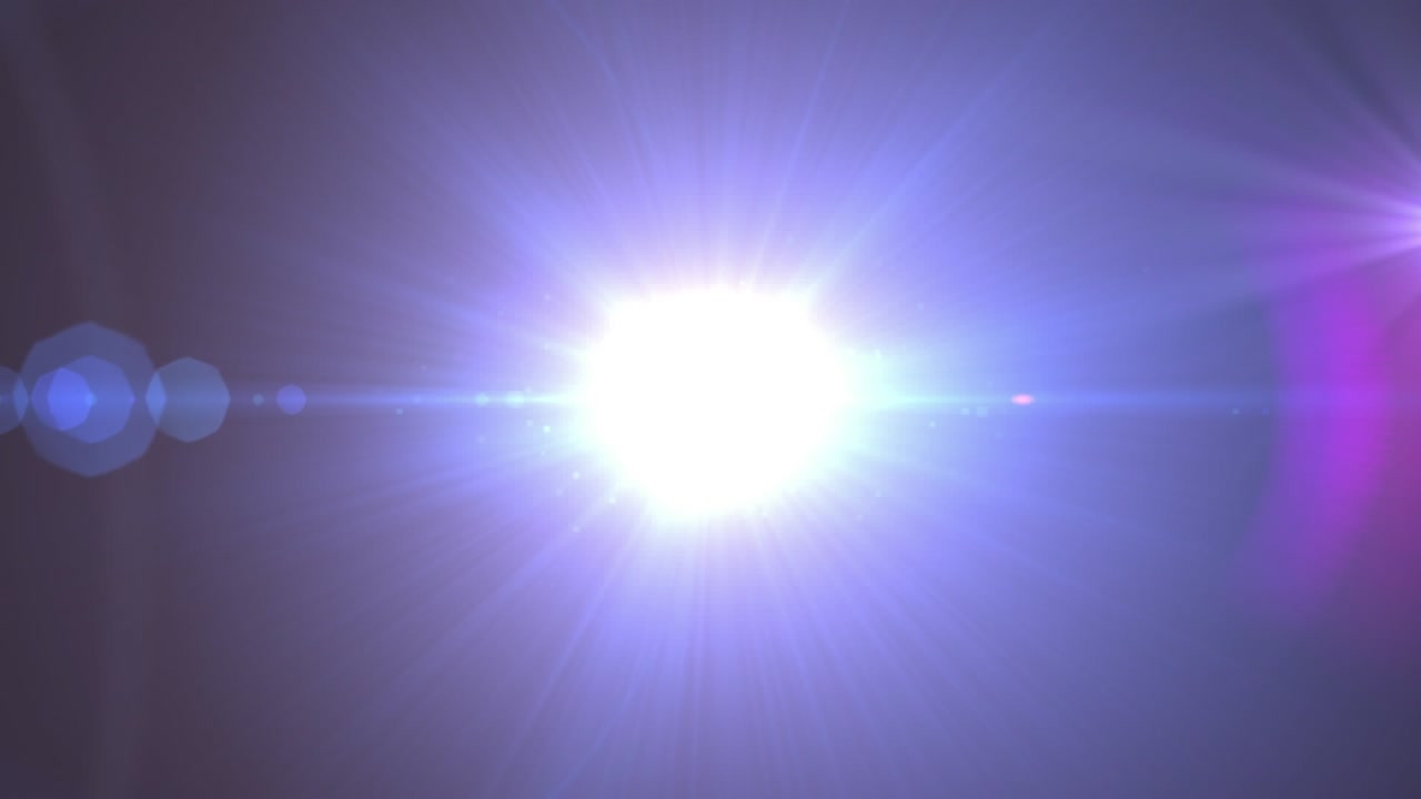 Animazione di luci brillanti su sfondo viola.