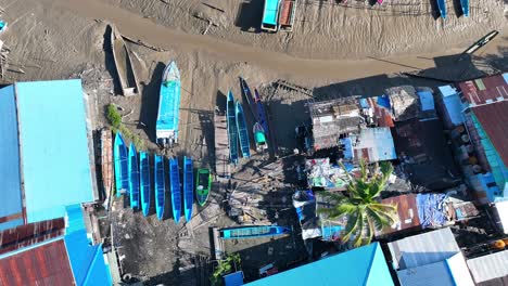 boats and residential areas with rivers at low tide make boats for sailing in asmat papua indonesia