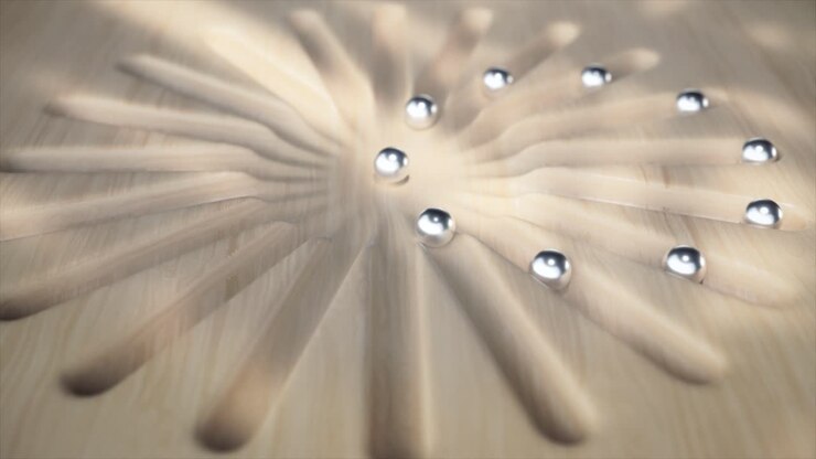 Silver Balls Rolling on Wooden Paths