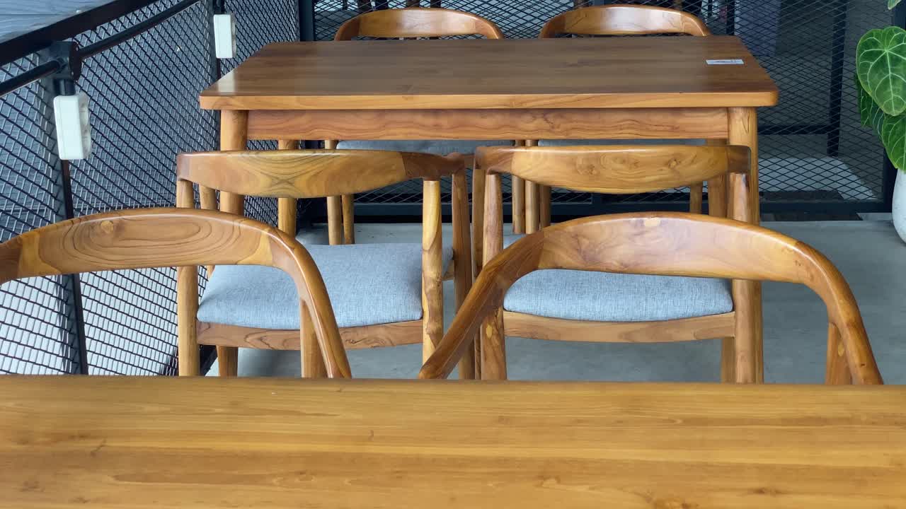 The footage shows the tables and chairs of customers of the concept coffee shop inside an aesthetic room.