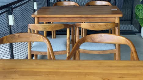 the footage shows the tables and chairs of customers of the concept coffee shop inside an aesthetic room.