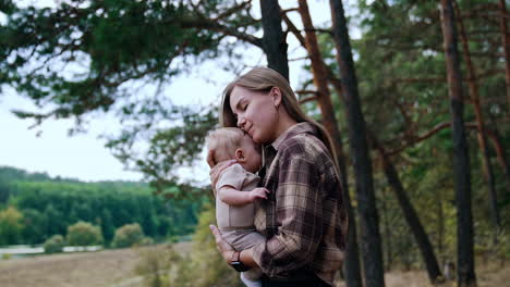 mother and baby in the forest