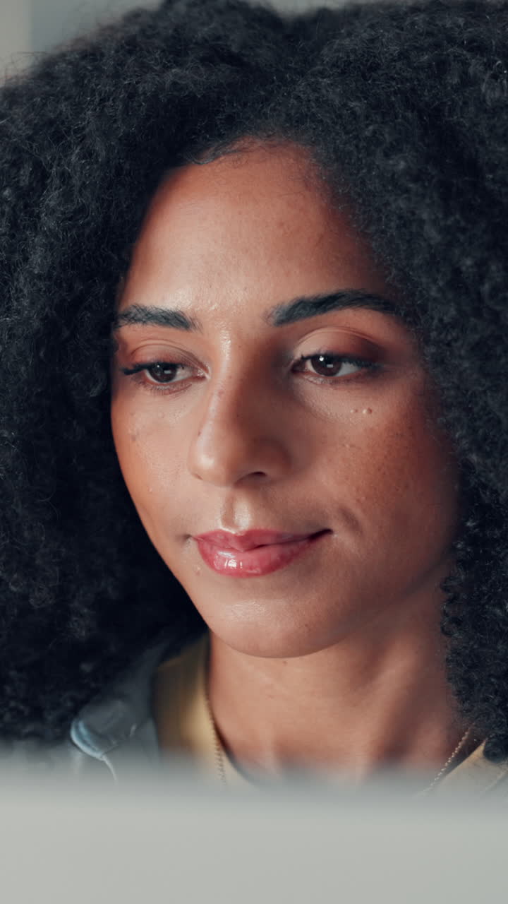 Close-up Portrait of a Young Woman Looking Down with Focus