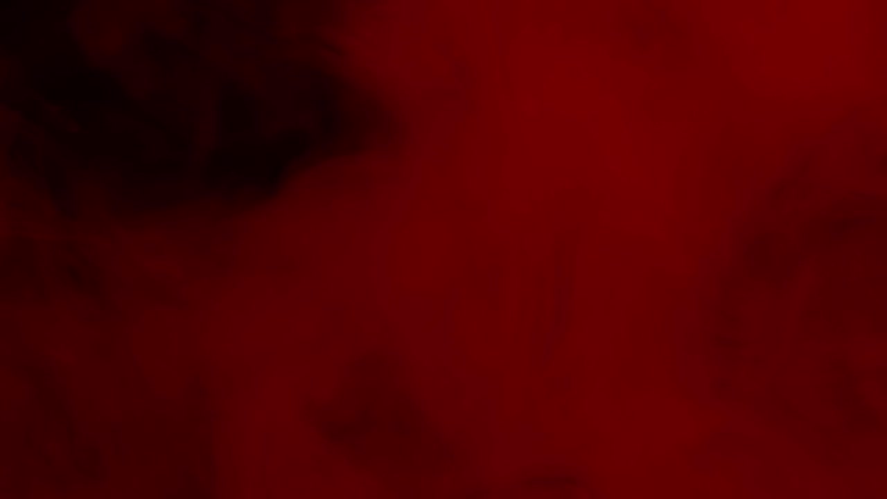 Vero fumo rosso su sfondo nero